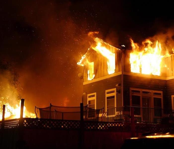 House on Fire at night 