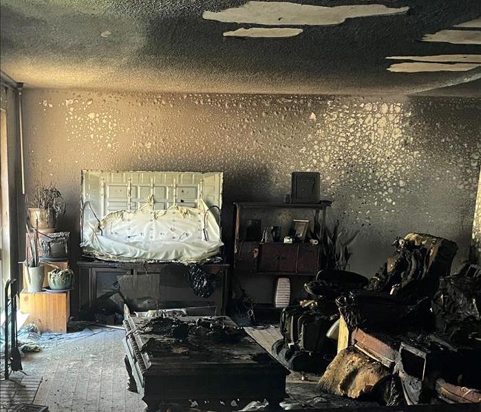 Fire, smoke and soot damage to living room